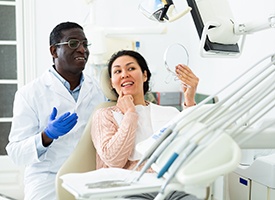 Woman smiling in the dental chair