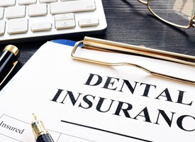 dental insurance paperwork for the cost of dental implants in Pittsburgh